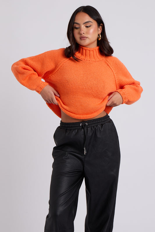 Orange Exposed Seam Roll Neck Jumper